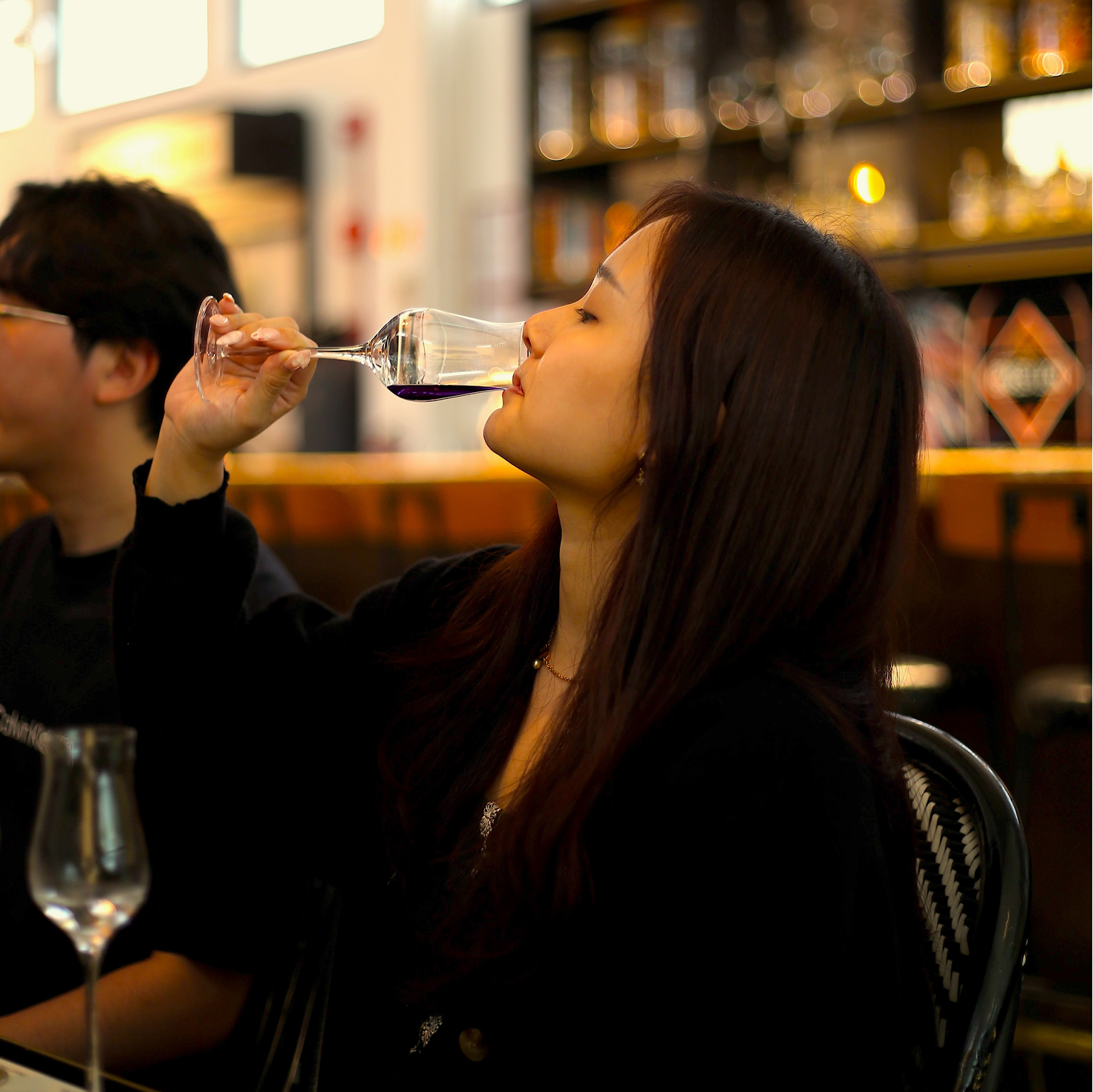 Guest enjoying a Brass Lion guided gin tasting session featuring handcrafted Singapore-made gins in the Brass Lion tasting room